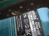 a close up of a cell phone that is sitting on a table