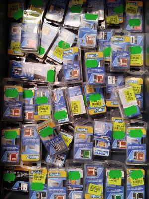 a display case filled with many different types of cell phones