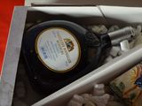 a bottle of liquor in a box with marshmallows in it