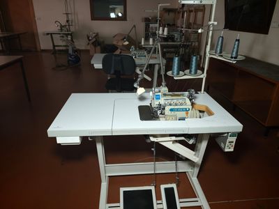 a sewing machine sitting on a table in a room