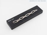 a close up of a black box with a chain on it