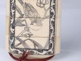 an image of a small box with a picture of a bird on it