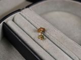 a ring in a box with a ring in it