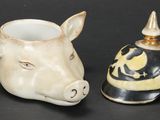 two cups that are sitting next to each other on a table