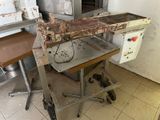 a machine that is sitting on a table in a kitchen