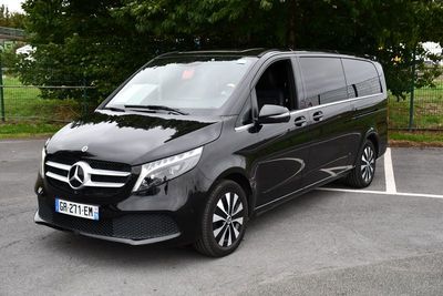 the mercedes v - class van is parked in a parking lot