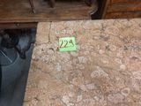 a yellow sticker on a table with a number twenty on it