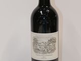 a bottle of wine that is sitting on a table