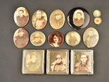 an image of a group of old photos of people on a table