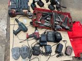 a lot of tools that are laying out on the floor