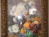 une peinture de fleurs dans un vase sur une table