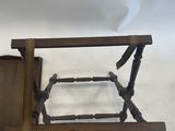 a wooden table with a glass top on a white background
