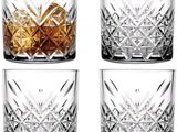 lot de quatre verres en cristal rehaussés de touches dorées et argentées