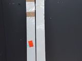 a stack of three boxes sitting on a shelf