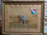 a picture of a man riding a horse with a kite