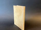 an image of a book sitting on top of a black table