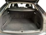 a trunk of a car with the back door open