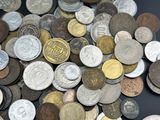a lot of coins that are on the table