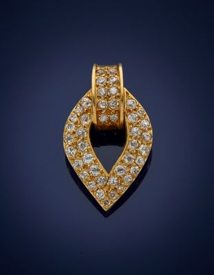 an 18k yellow gold and diamond pendant
