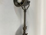a close up of a shower head with a light on it