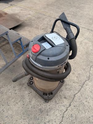 a vacuum that is sitting on the ground