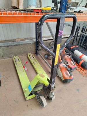 a picture of a pallet with a number on it in a garage