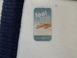 a picture of a towel with a sticker on it