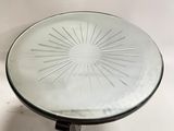 an image of a glass table with a starburst design on it