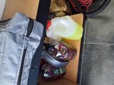 a box full of items that are sitting on the floor