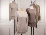 three mannequins that are on display in a room