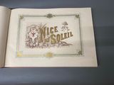 an open book with a picture of a dog and a cat on it