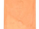 a close up of a piece of clay on a white surface