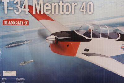 a picture of a box with a model of a plane