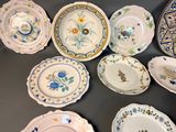a lot of plates that are on a table