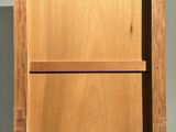 a picture of a wooden shelf with two shelves on it