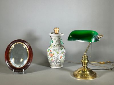 two lamps and a mirror sitting on a table