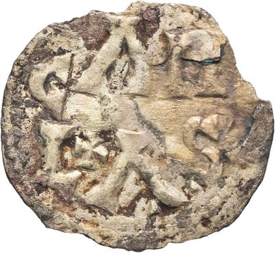 un gros plan d'une pièce de monnaie sur laquelle figurent un cheval et un cavalier