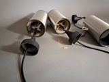 three different types of hair dryers sitting on a table