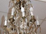 a chandelier hanging from the ceiling in a room