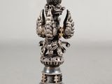 an image of a statue of a person on a pedestal