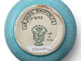 an image of a blue and white bowl with a label on it