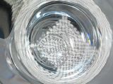 a glass of water that is sitting on a table