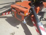 a machine that is sitting on the ground in the parking lot