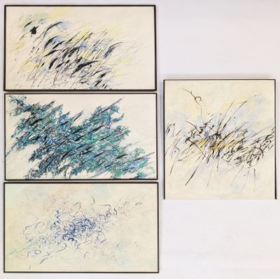 three paintings on a wall of different shapes and sizes