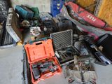 a lot of tools that are sitting on the floor