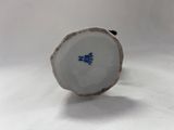 porcelain figurine of a blue and white flower on a white background