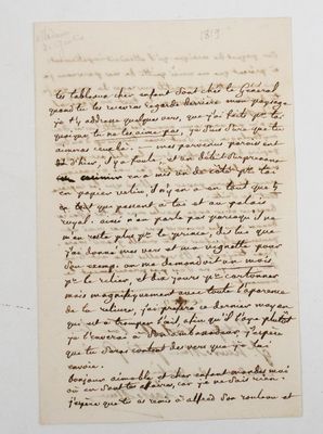 lettre manuscrite écrite à l'encre noire sur une feuille de papier