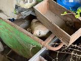 a pile of junk that is sitting on the ground