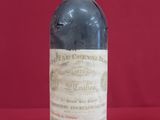 a bottle of wine that is sitting on a table