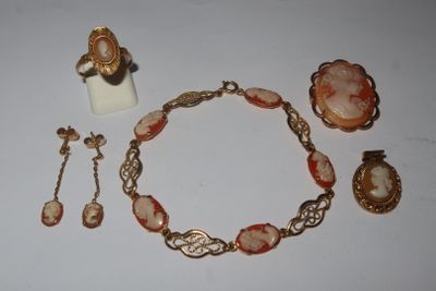 an image of a collection of jewelry including a necklace, bracelet, and ring